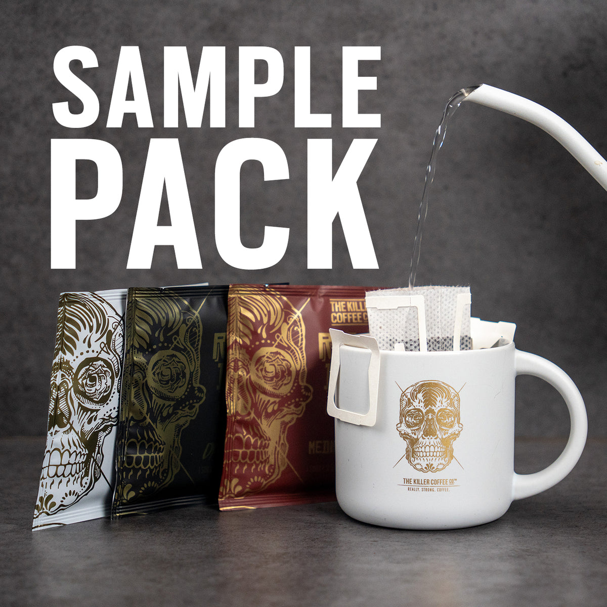 Tea packaging with skull designs and a mug being filled with tea bags on a dark background.